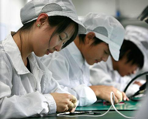 Trabajadores de Foxconn para Apple en China