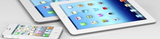 iPad Mini en color blanco junto con el nuevo iPad y el iPhone 4S