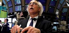 Broker con pelo blanco en Wall Street