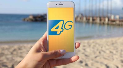 iPhone 6 blanco en la playa con logo 4G