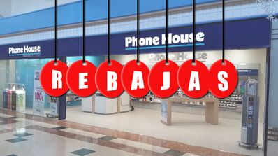 cartel de rebajas con tienda phone house al fondo