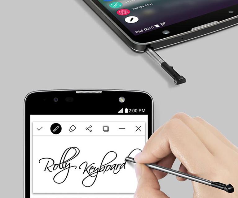 LG Stylus 2 Plus con lápiz escribiendo a mano