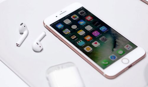 iphone 7 rosa con auriculares Airpod