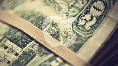Logo de Apple sobre billetes