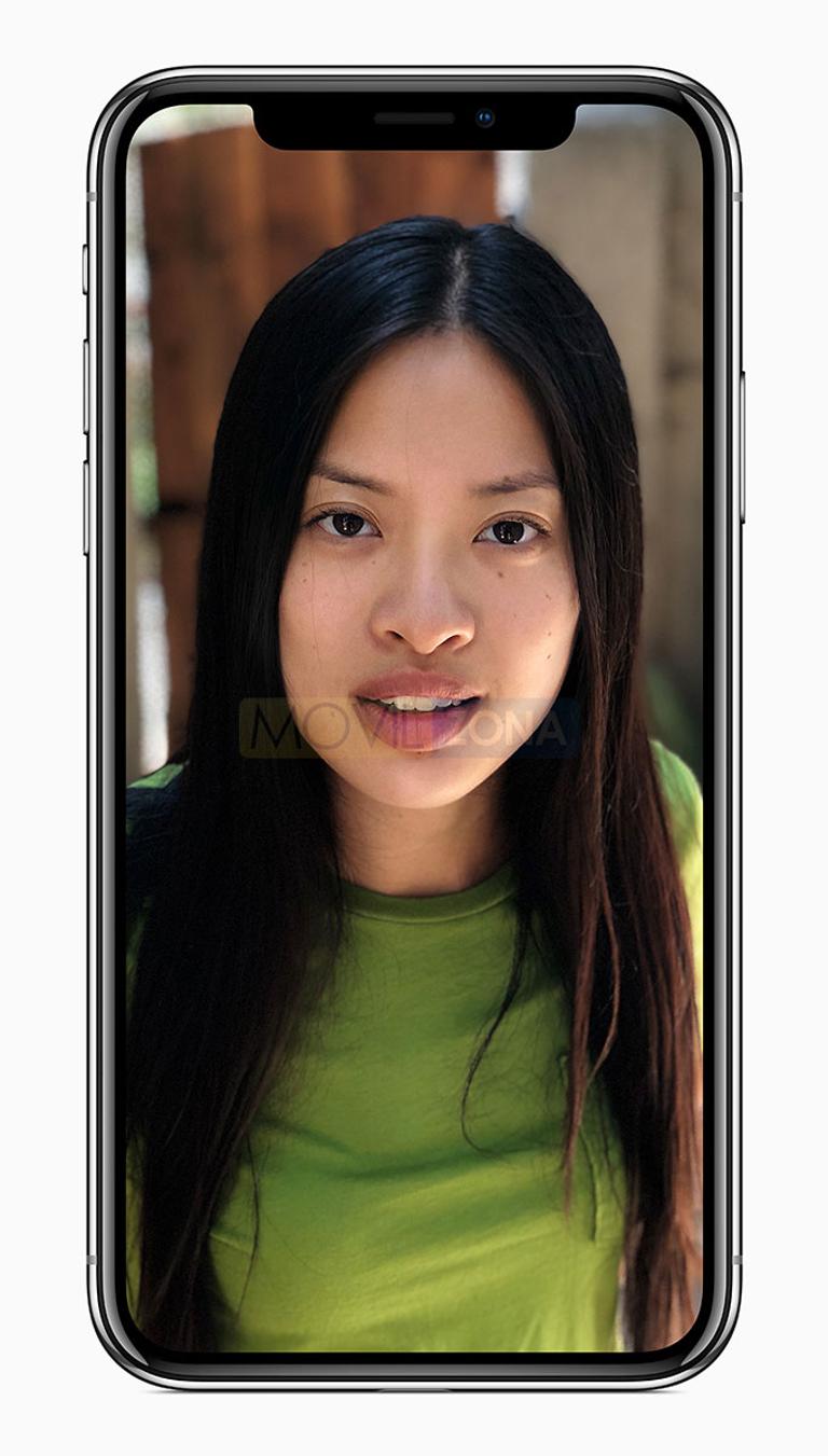 Apple iPhone X con chica en la pantalla