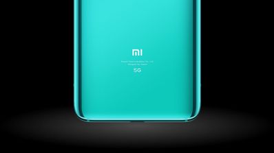 xiaomi verde y fondo negro