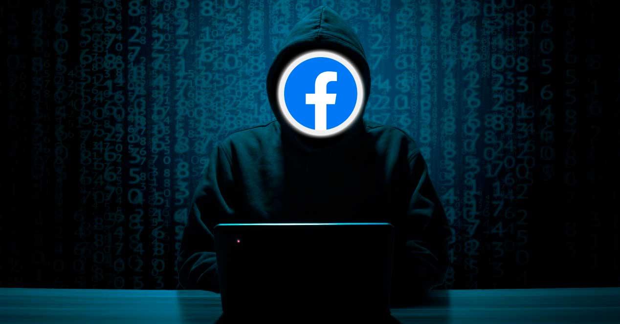 Hacker con logo de Facebook