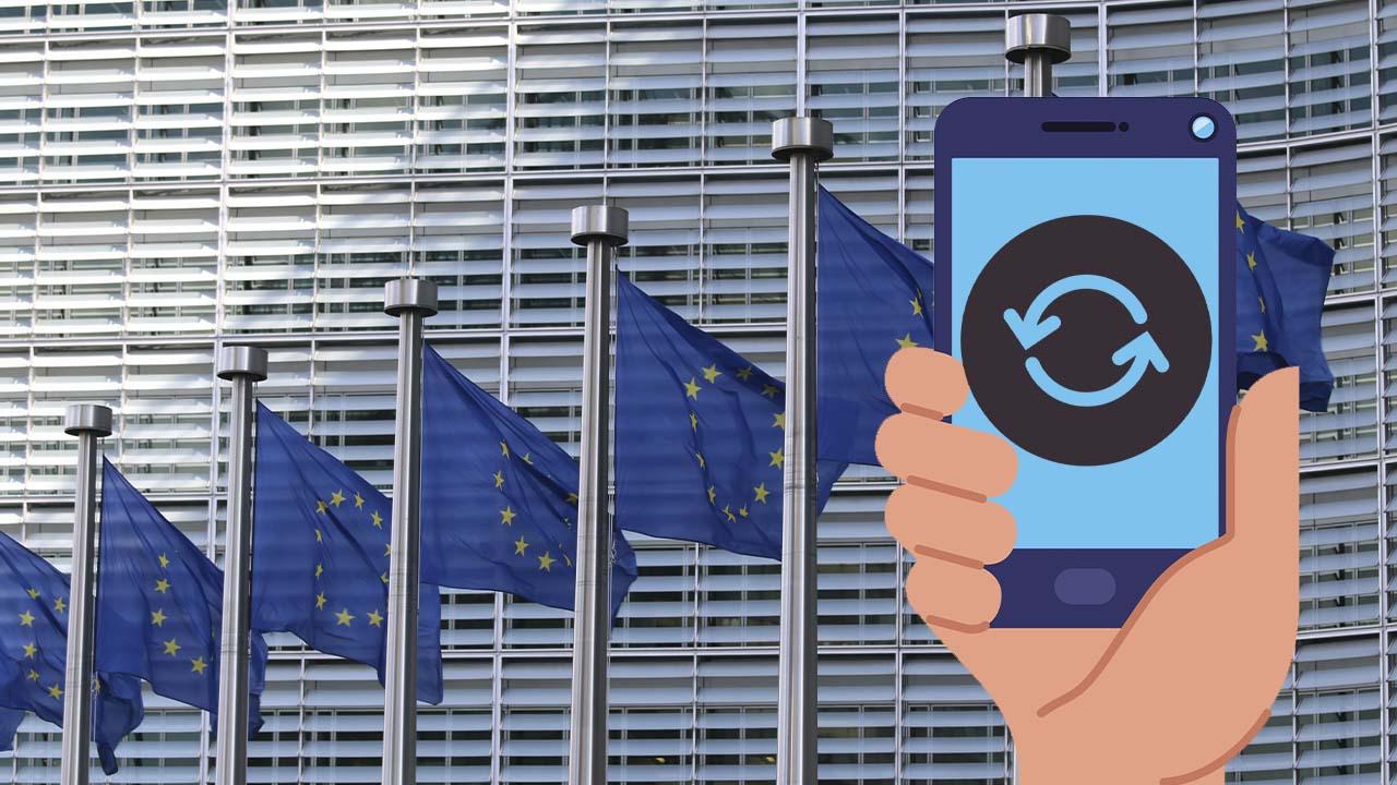 banderas de la unión europea y un móvil actualizándose