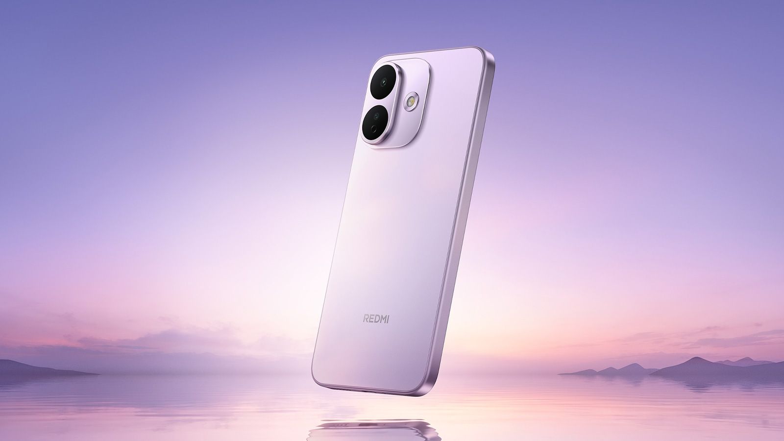 Teléfono inteligente REDMI Note 17 Pro 5G en color morado flotando sobre una superficie acuática al amanecer.