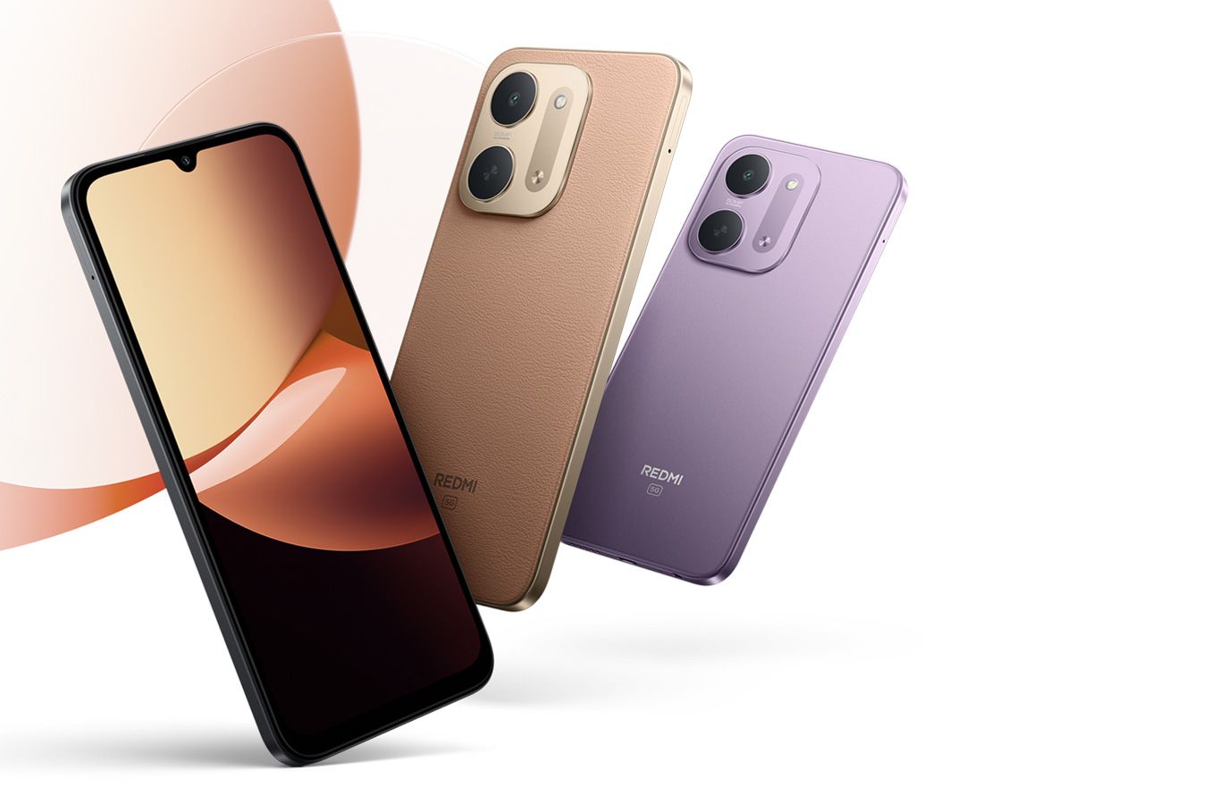 Tres unidades del Redmi 17C 5G en colores negro, dorado y violeta dispuestos en ángulo.