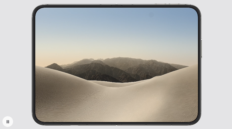 Render frontal de un iPhone Duo con pantalla completa mostrando un paisaje desértico.