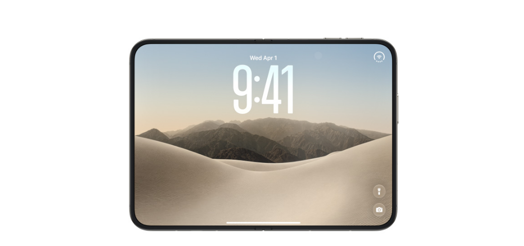 Pantalla de bloqueo del iPhone Duo en formato horizontal con fondo de dunas y reloj centrado.