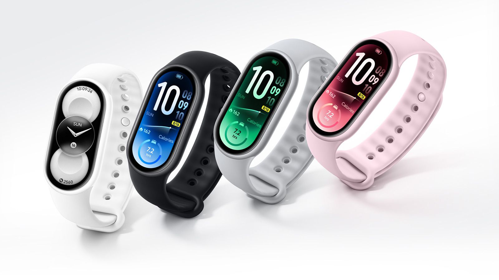 Cuatro pulseras inteligentes Xiaomi Smart Band 11 en colores blanco, negro, gris y rosa con diferentes esferas digitales.