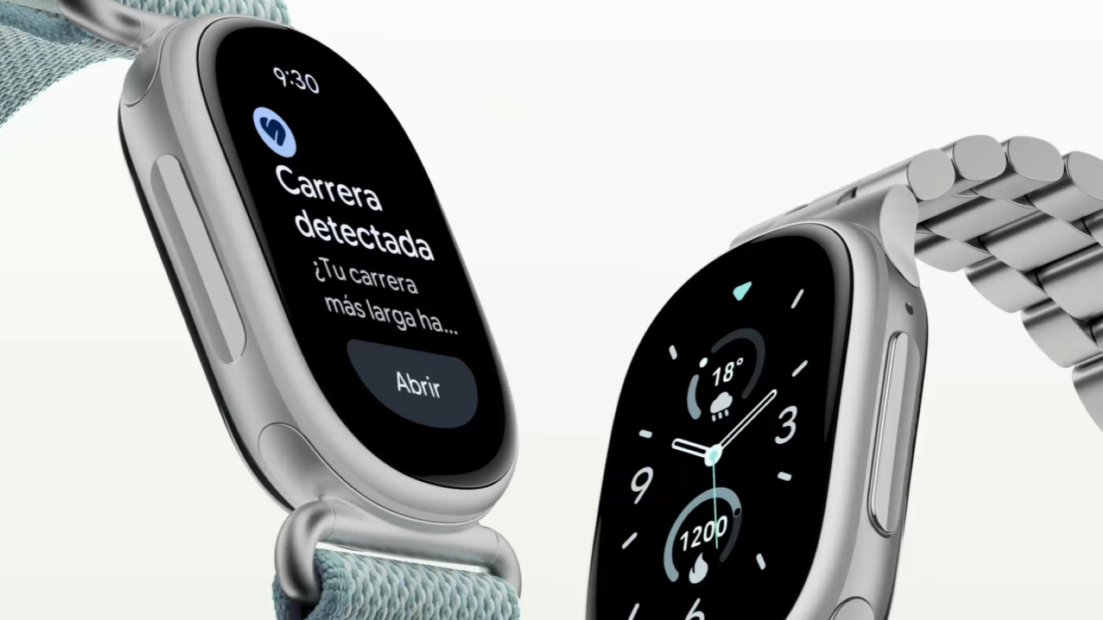 Primer plano de dos Google Fitbit Edge con cajas metálicas, mostrando una notificación de carrera detectada y una esfera de reloj analógica.