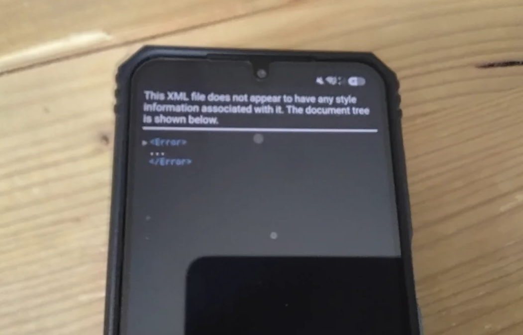 Mensaje de error de lectura de archivo XML en la pantalla de un móvil Samsung.