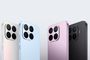 Vista trasera de cuatro teléfonos móviles alineados que muestran sus módulos de cámara traseros en acabados beige, azul claro, rosa y negro.