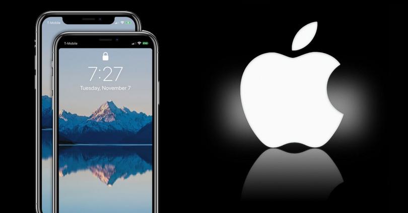 Apple-logotypen och iphone con notch